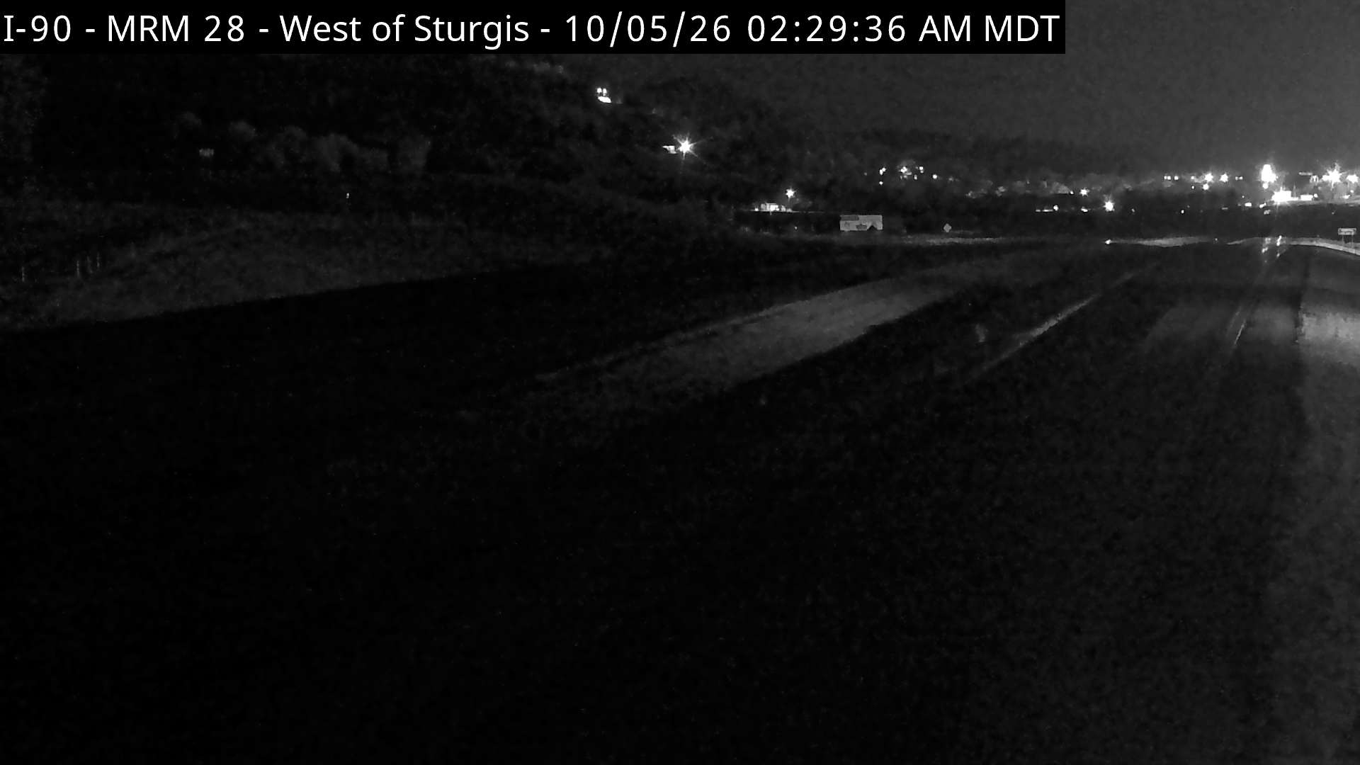 Sturgis - west of town along I-90 @ MP 28.6 (road surface) live camera view