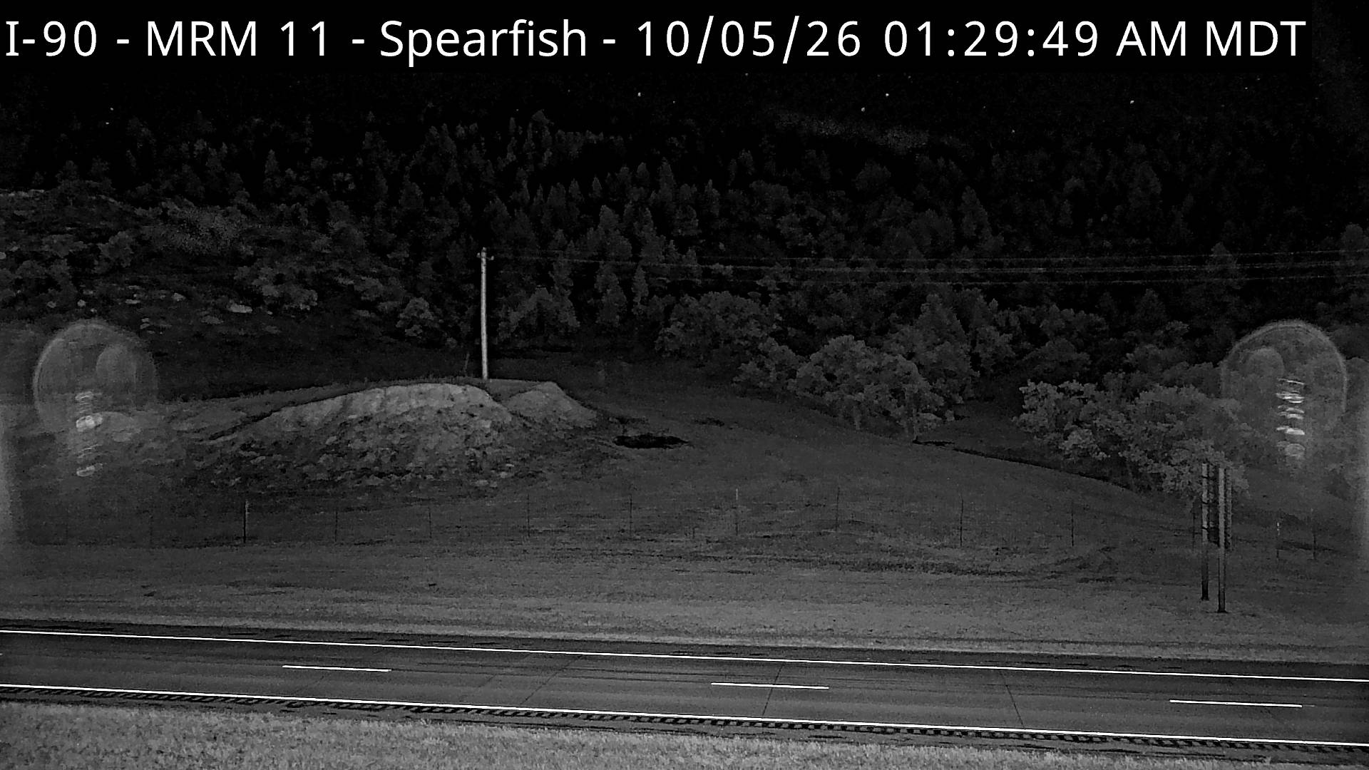 Spearfish - west of town along I-90 @ MP 11 WB lands (North) live camera view
